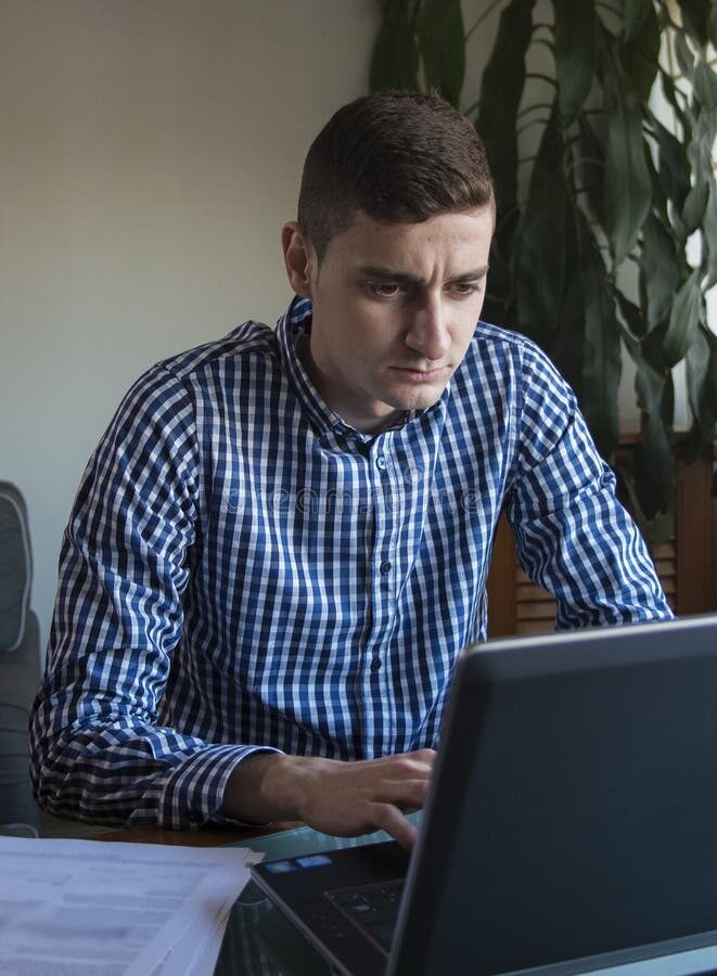 AI developer working on laptop