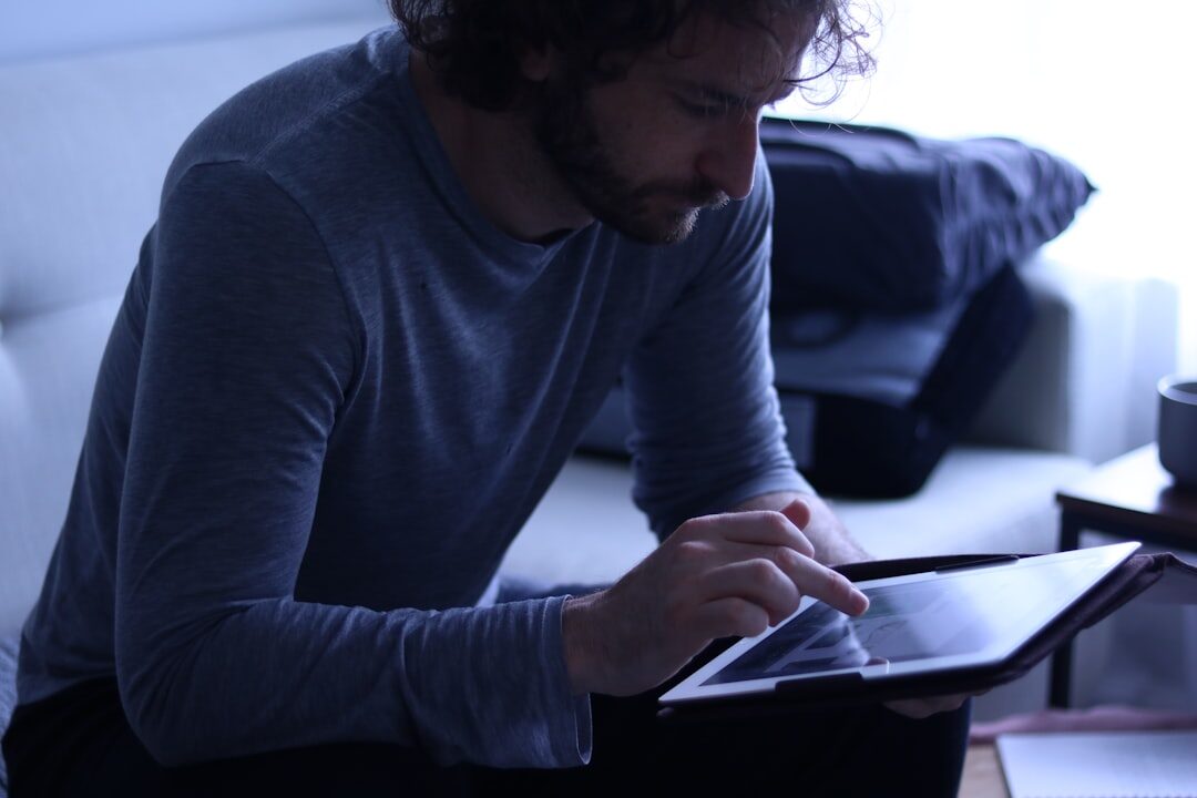 man analyzing data on computer