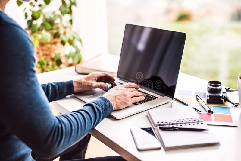 man working on a desktop