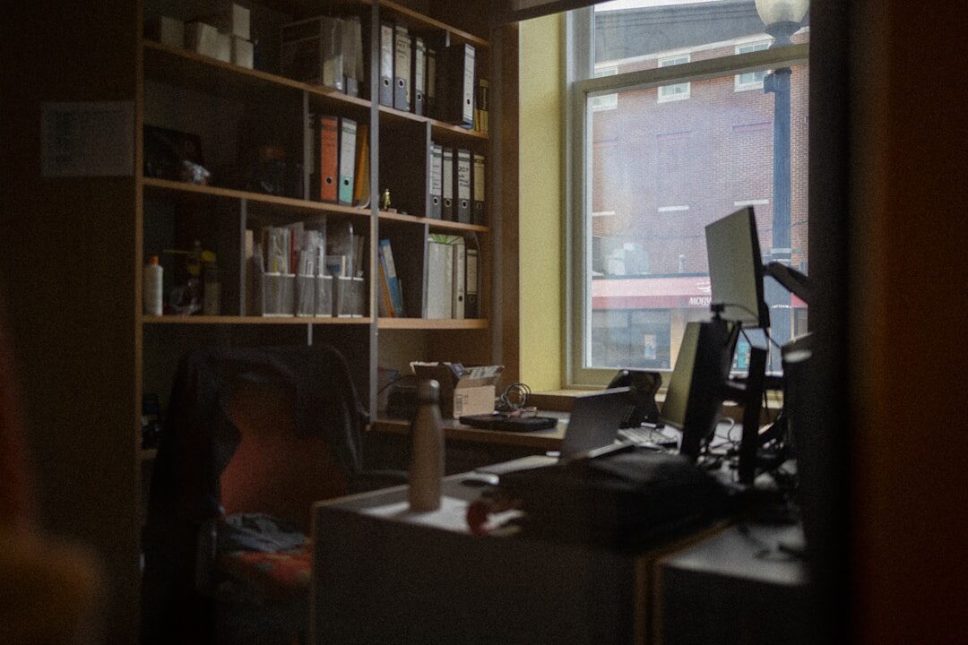 man working on laptop in office