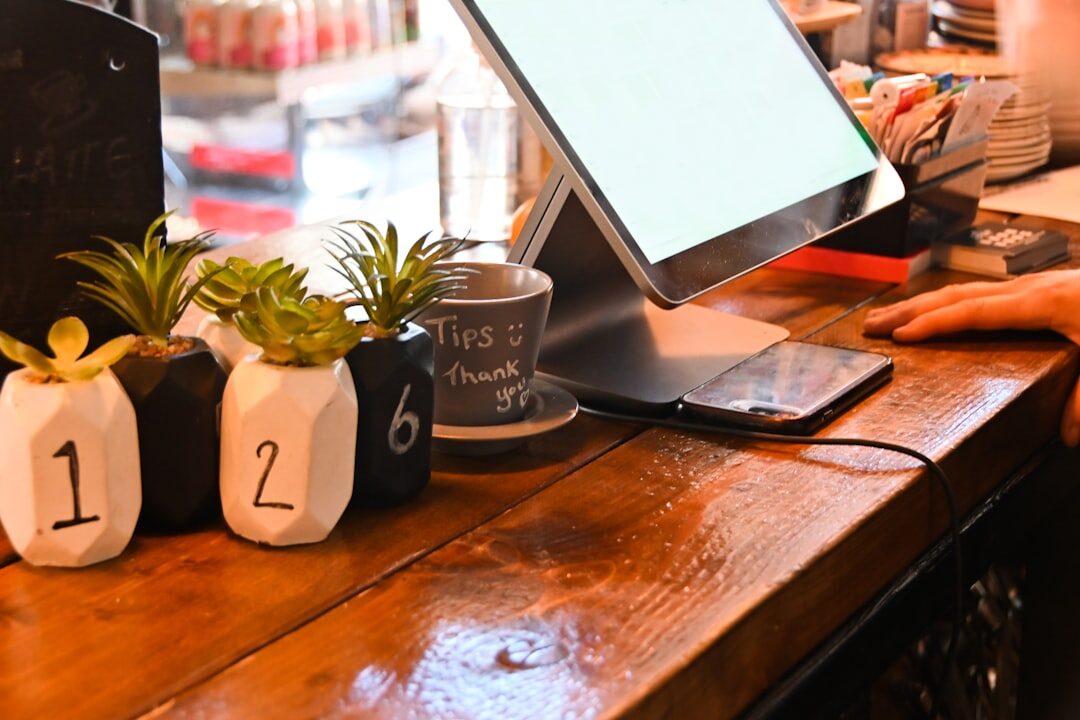 managed WordPress hosting provider working on laptop