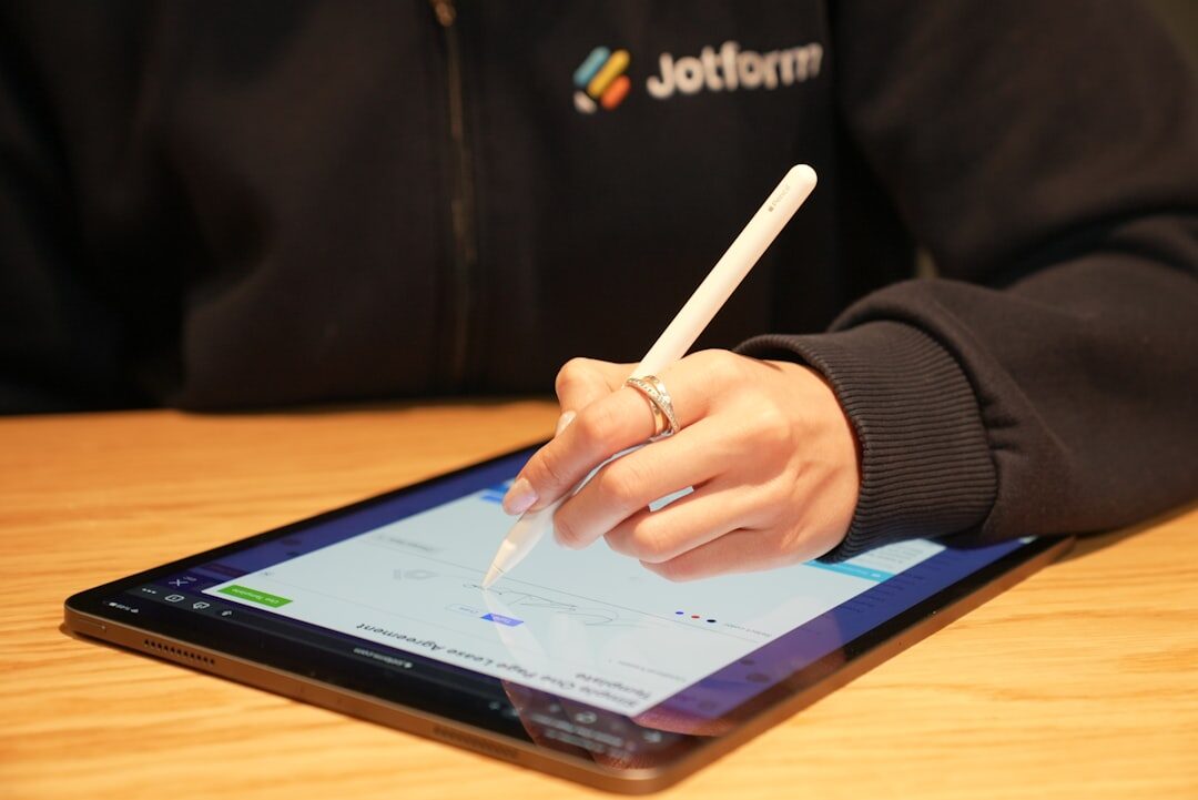 person holding apple m4 pro