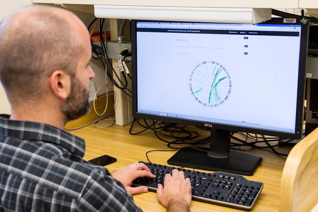 researcher analyzing data on computer
