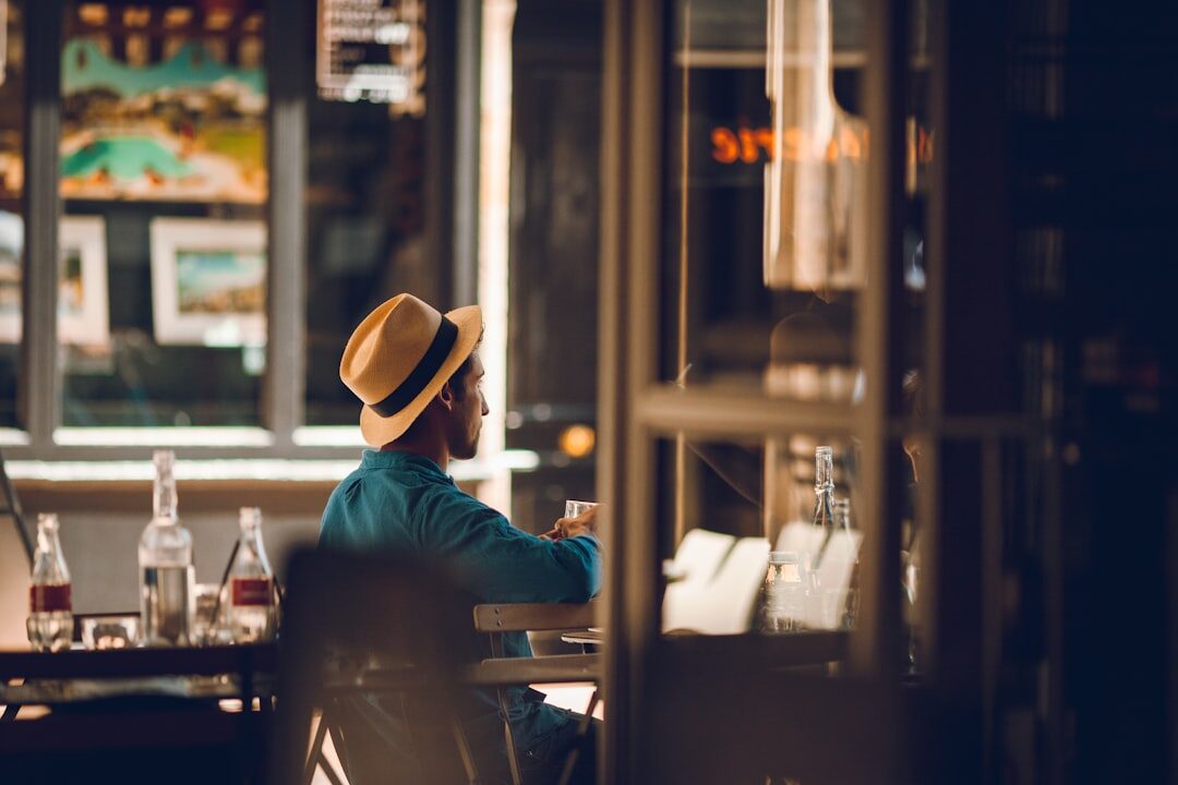 woman working on laptop in coffee shop